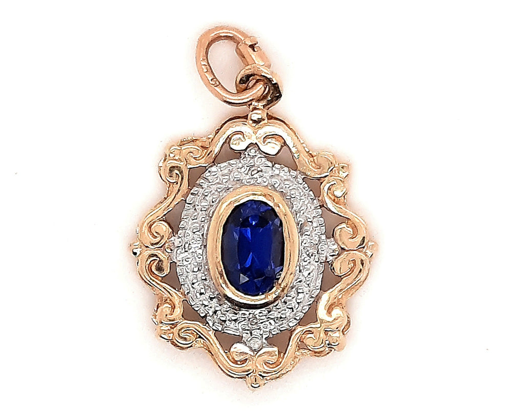 Sapphire & Diamond 9ct Yellow Gold Pendant with Scroll Surround