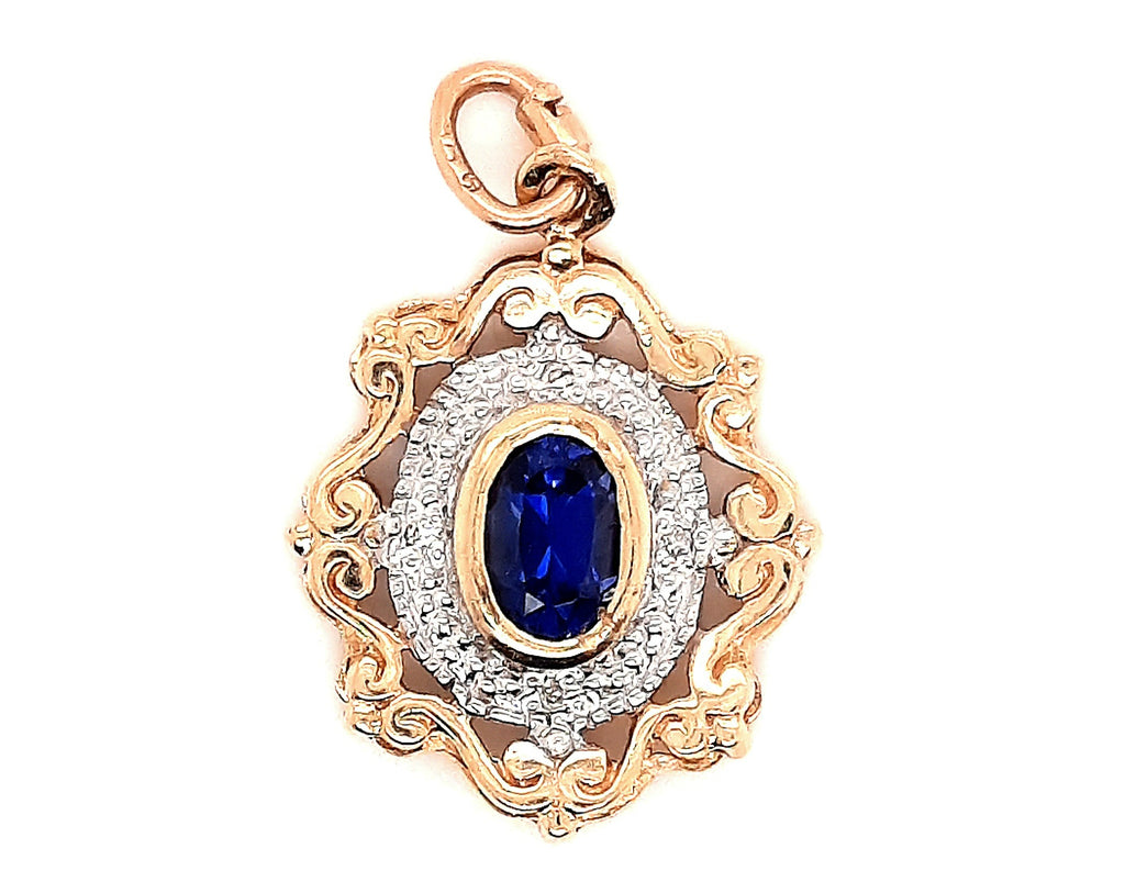 Sapphire & Diamond 9ct Yellow Gold Pendant with Scroll Surround